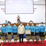ສະຖາບັນການເມືອງ ແລະ ການປົກຄອງແຫ່ງຊາດ ໄດ້ຮັບທຸງໄຊ ຈາກສູນກາງສະຫະພັນແມ່ຍິງລາວ ແລະປະຖະກະຖາ, ສະເຫຼີມສະຫຼອງວັນແມ່ຍິງສາກົນຄົບຮອບ 112 (8.3.1910-8.3.2022)